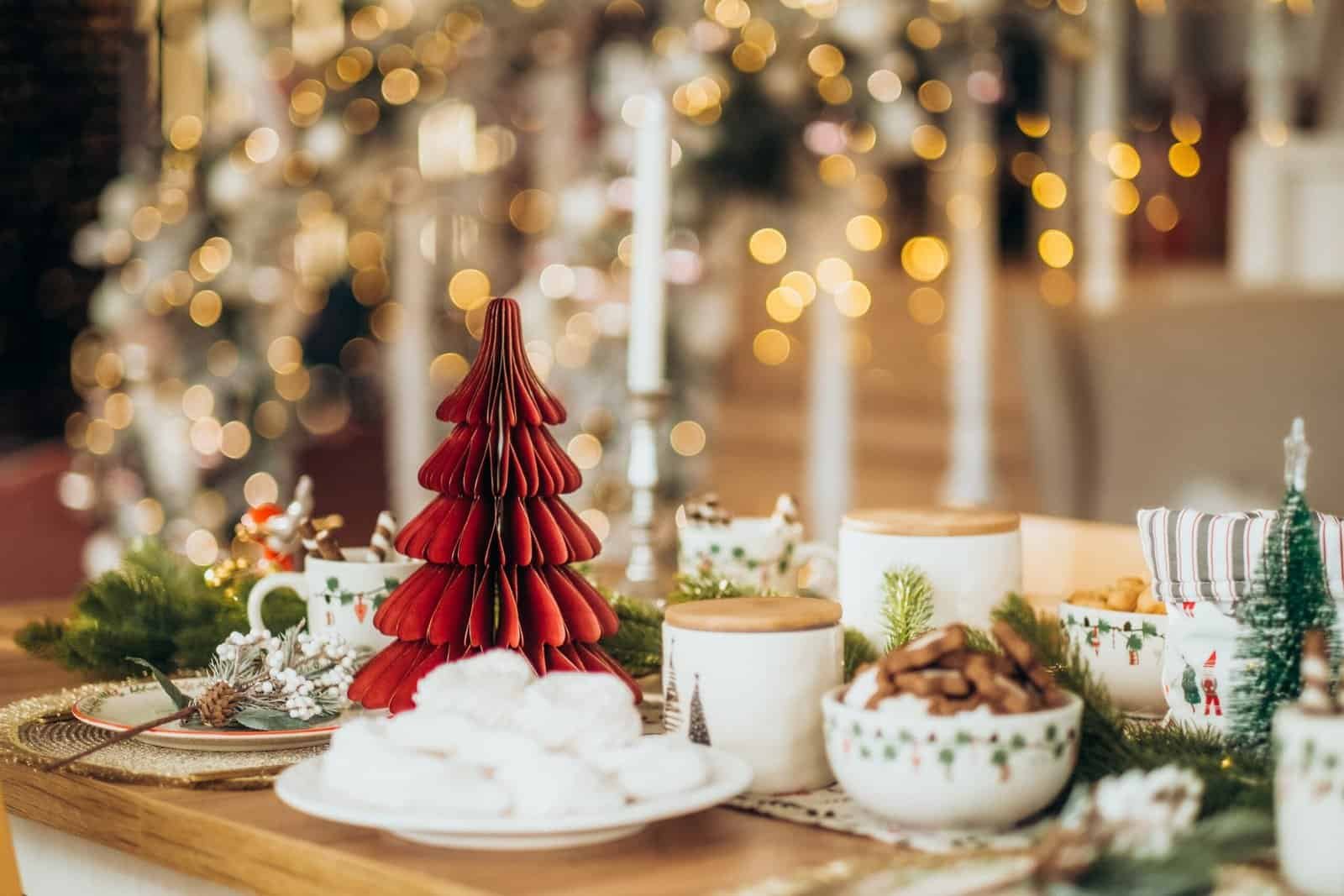 a table with a christmas tree and a christmas tree