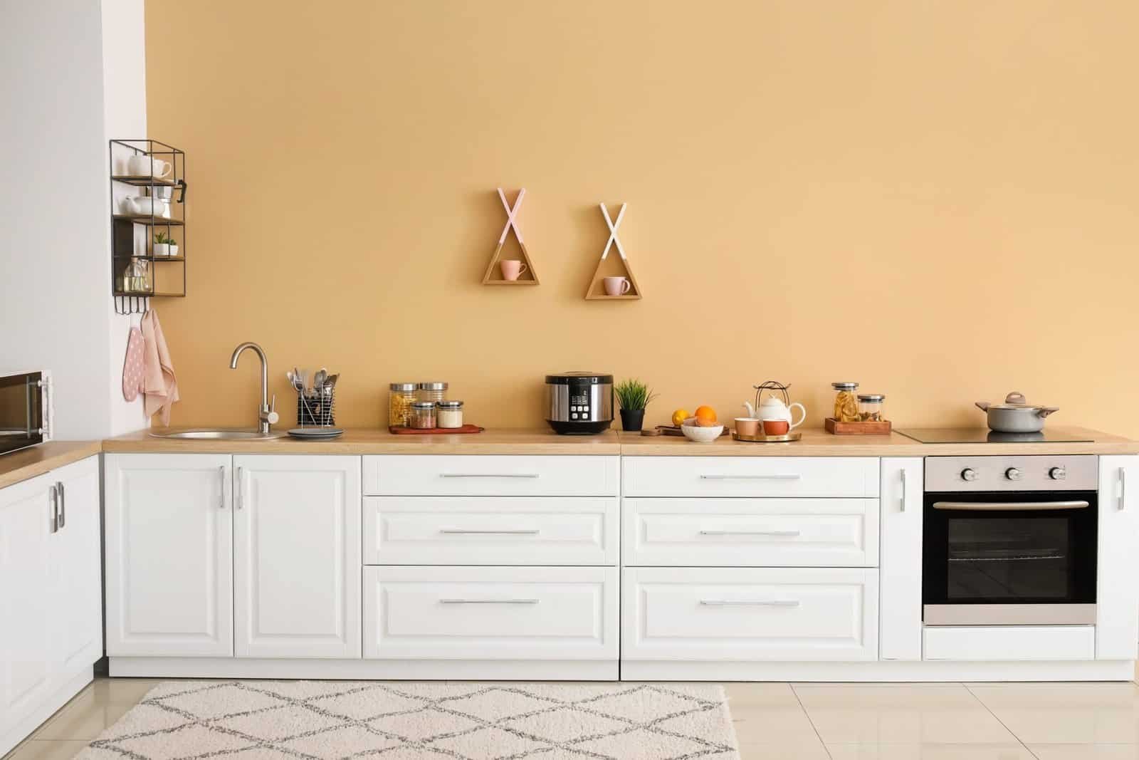 10 Kitchen Counter Decor Ideas 3 a kitchen with a stove top oven and a microwave